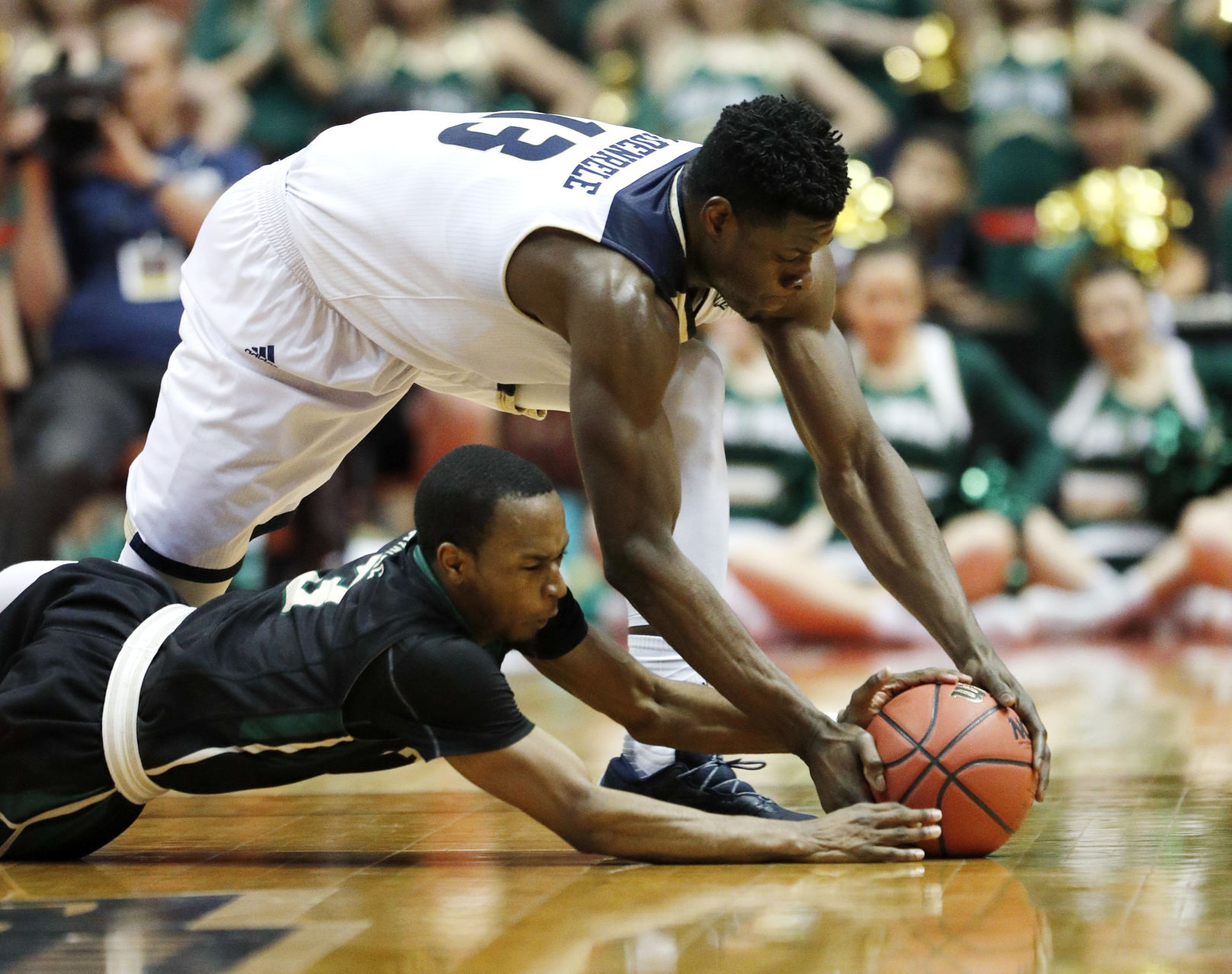APTOPIX BWest Cal Poly UC Davis Basketball